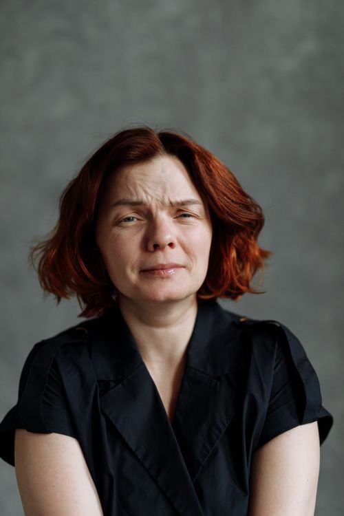 Free Portrait of a woman with a distressed expression, reflecting sadness or stress. Stock Photo