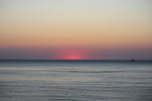 Dreamy Sunset Sky Over a Sea 