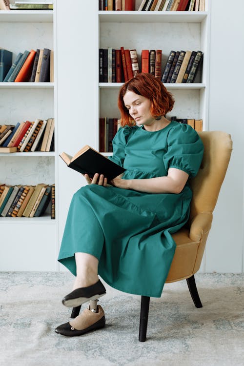 A Woman Reading Book in the Library