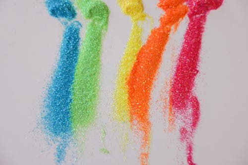 Free Rainbow Colors Glitters in Close-up Shot Stock Photo