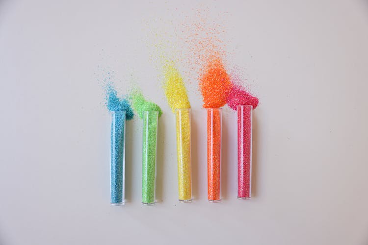 Colored Powder On Glass Tubes