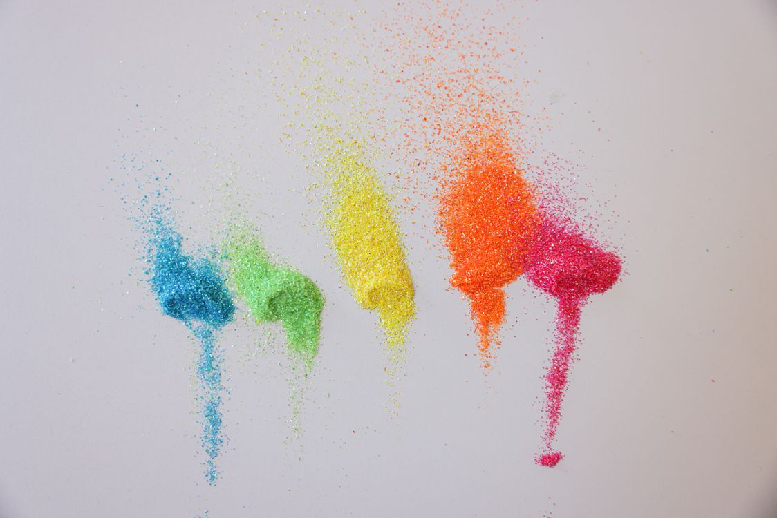 Clear Color Powder Colorful Powder on a White Surface · Free Stock Photo
