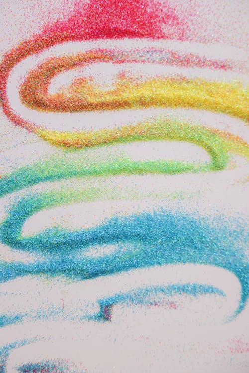 Colored Grains on White Surface