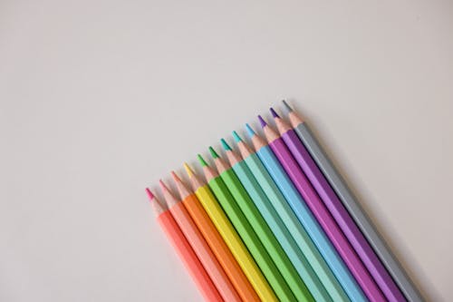 Sharpened Colored Pencils on a White Surface