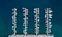 White and Black Boat on Body of Water