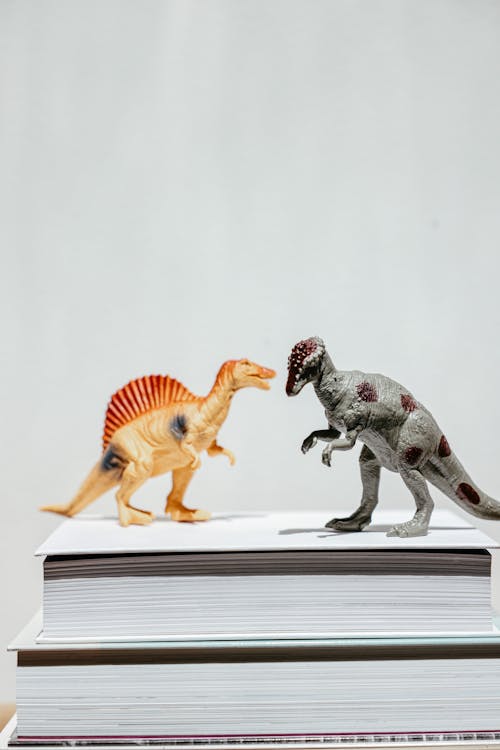 Two Miniature Dinosaurs Standing