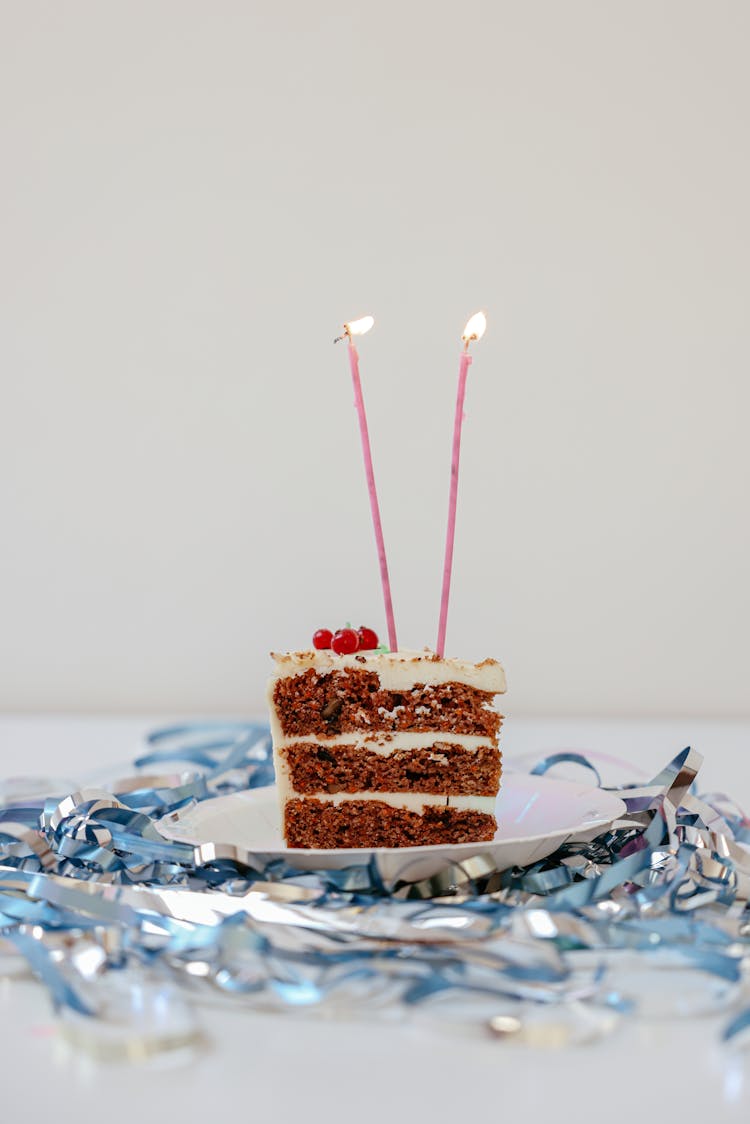 Candles On A Sliced Birthday Cake