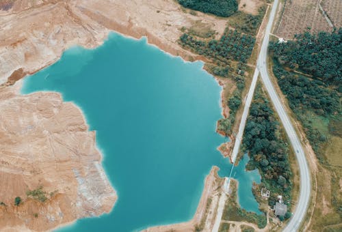 Aerial Photo of Lake Near Highway