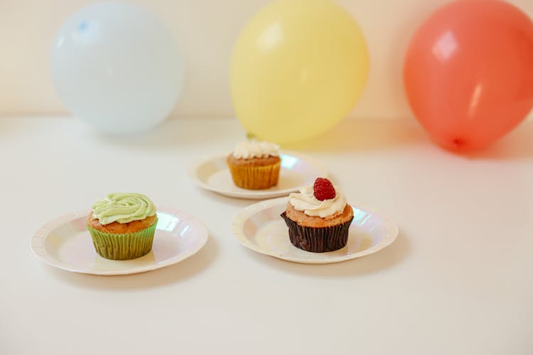 An Assortment Of Birthday Cupcakes