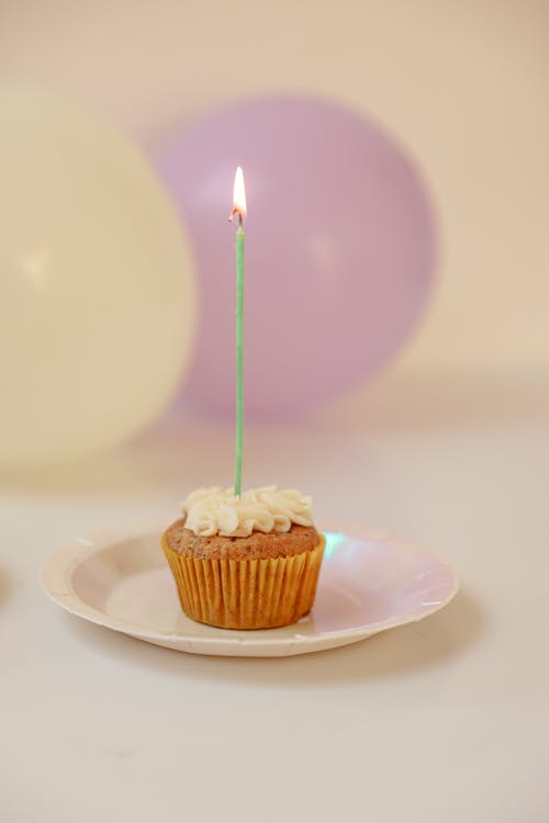 Lighted Candle on Cupcake
