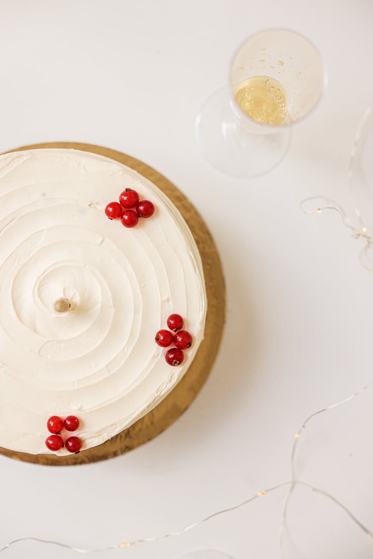 A Cake With Red Berries Topping