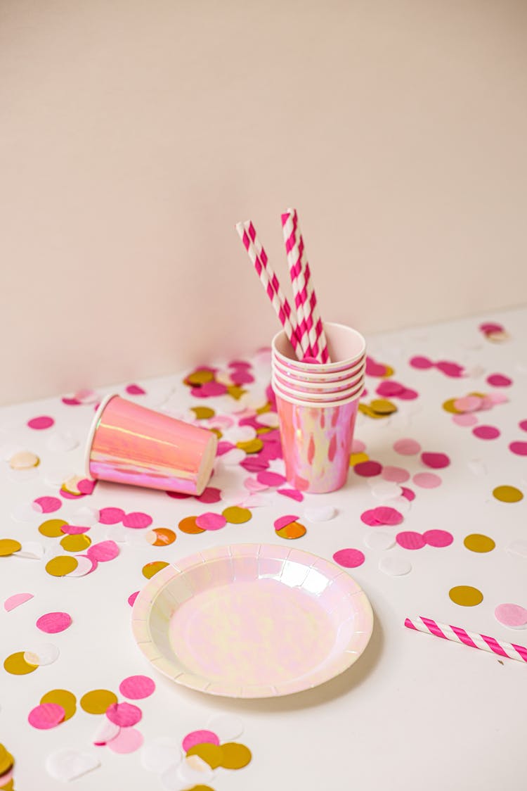 Disposable Paper Cups And Plates On The Table