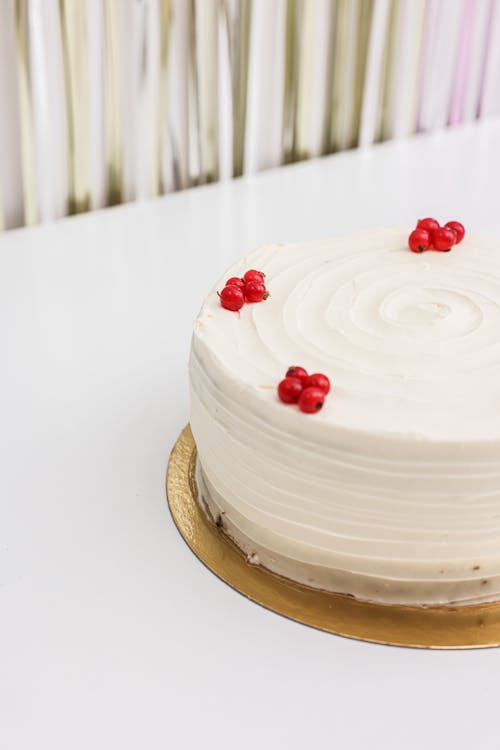 Free Red Berries Topping on a Birthday Cake Stock Photo