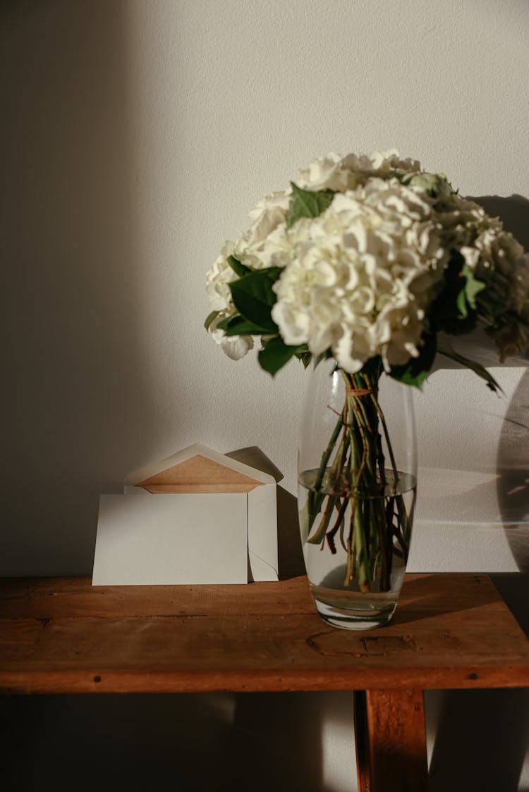 White Flower Bouquet On Clear Glass Vase