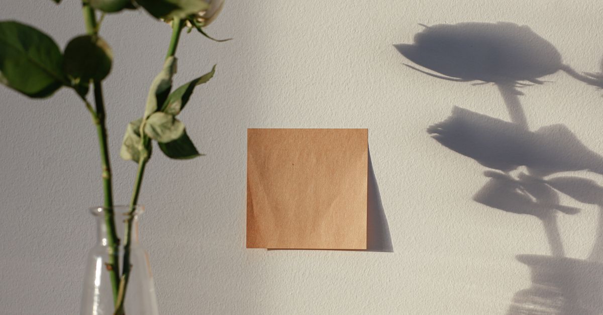 A Brown Sticky Note on the Wall · Free Stock Photo