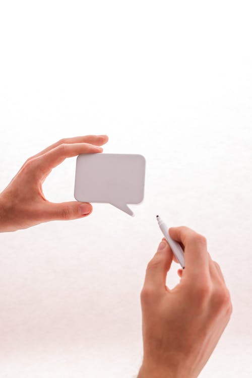 A Person Holding a Marker and a Thought Bubble