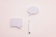 White Apple Magic Mouse on White Table