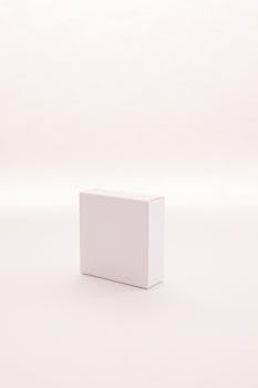 Simple white box on a soft background, ideal for product mockup or design showcase.