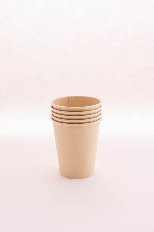 Free A minimalist photo of stacked brown paper cups showcasing sustainability. Stock Photo