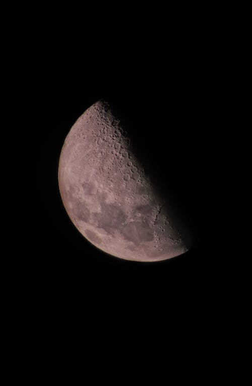 A Quarter Moon in Dark Night Sky