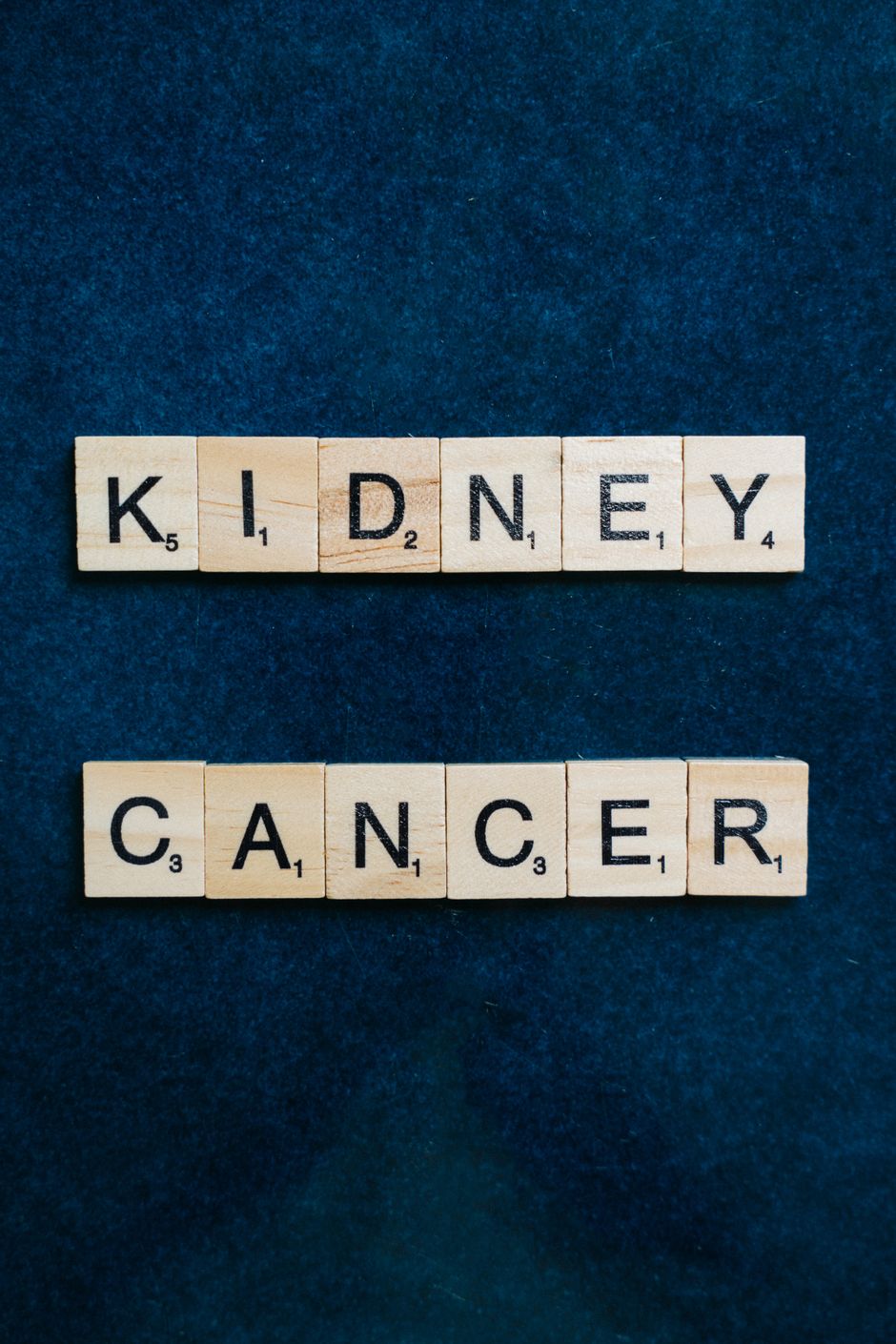 Kidney cancer awareness lettering on blue