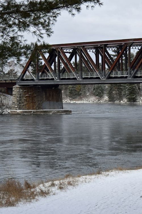 Railroad Bridge Over River In Winter Free Stock Photo railroad-bridge-over-river-in-winter-free-stock-photo