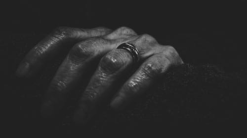 Free Close-Up Photography of a Hand With Ring Stock Photo