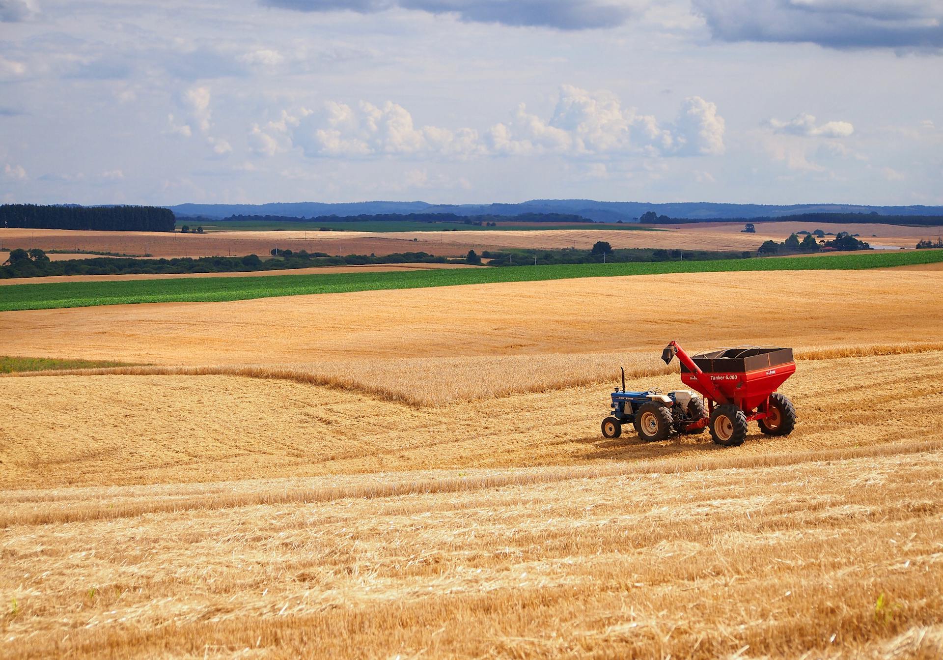A Tractor Plowing the Agricultural Field