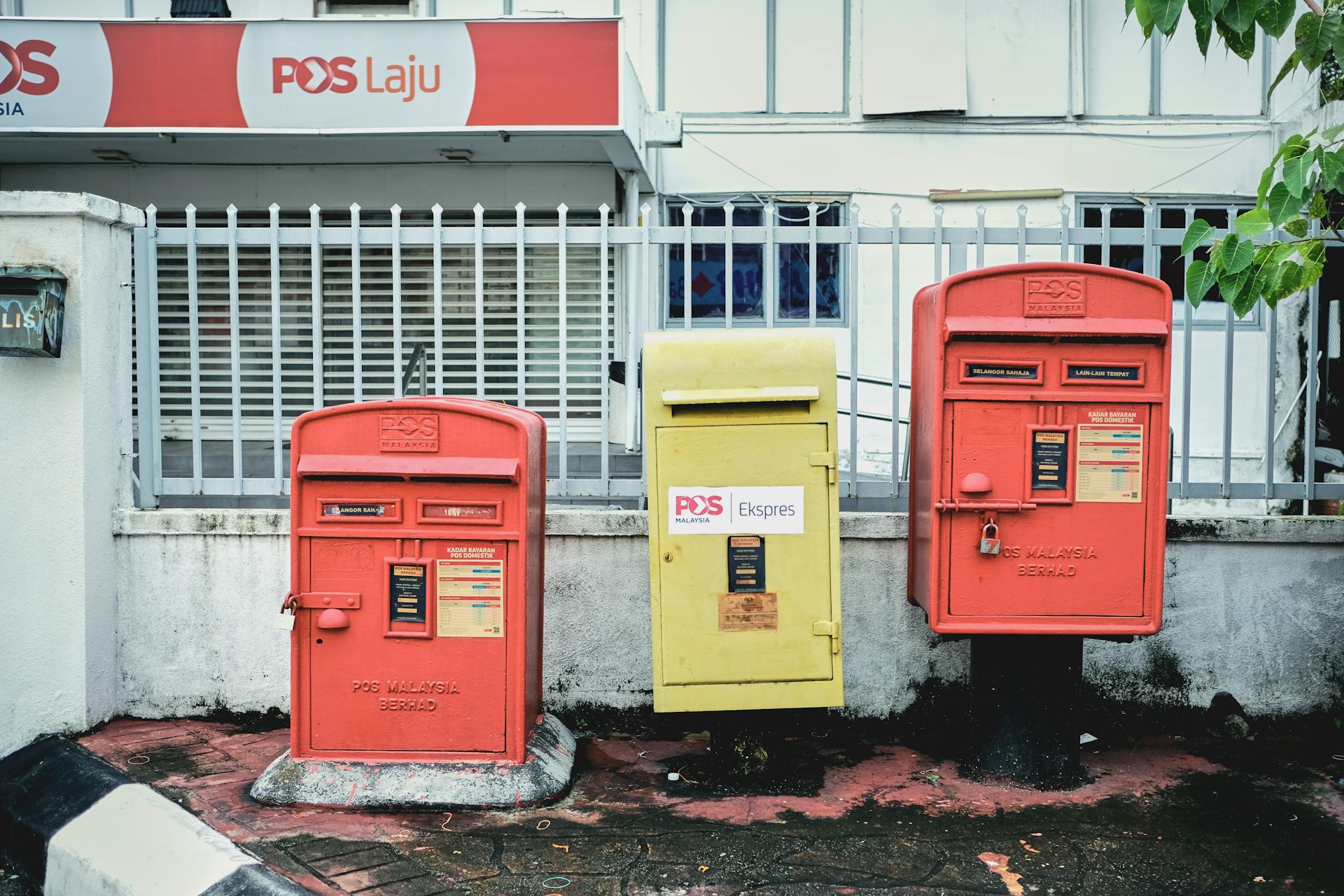 Red and Yellow Mailboxes