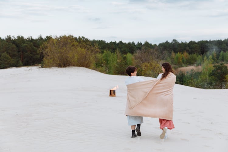 Women Walking Outdoor In The Whitesand