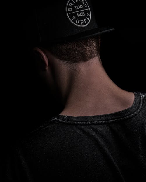Free Men's Gray Shirt and Black Fitted Cap Stock Photo
