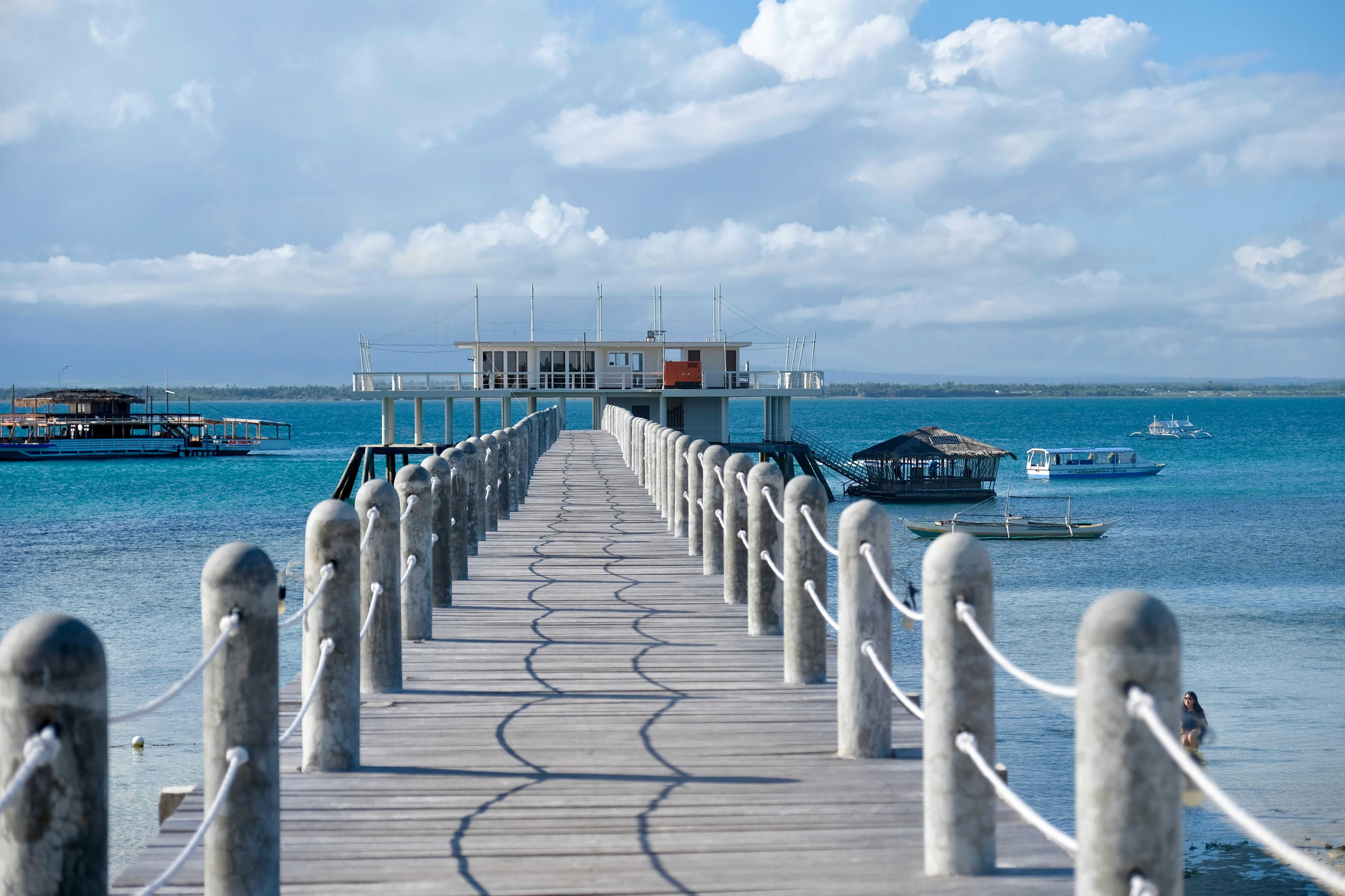 a wooden pier over the sea