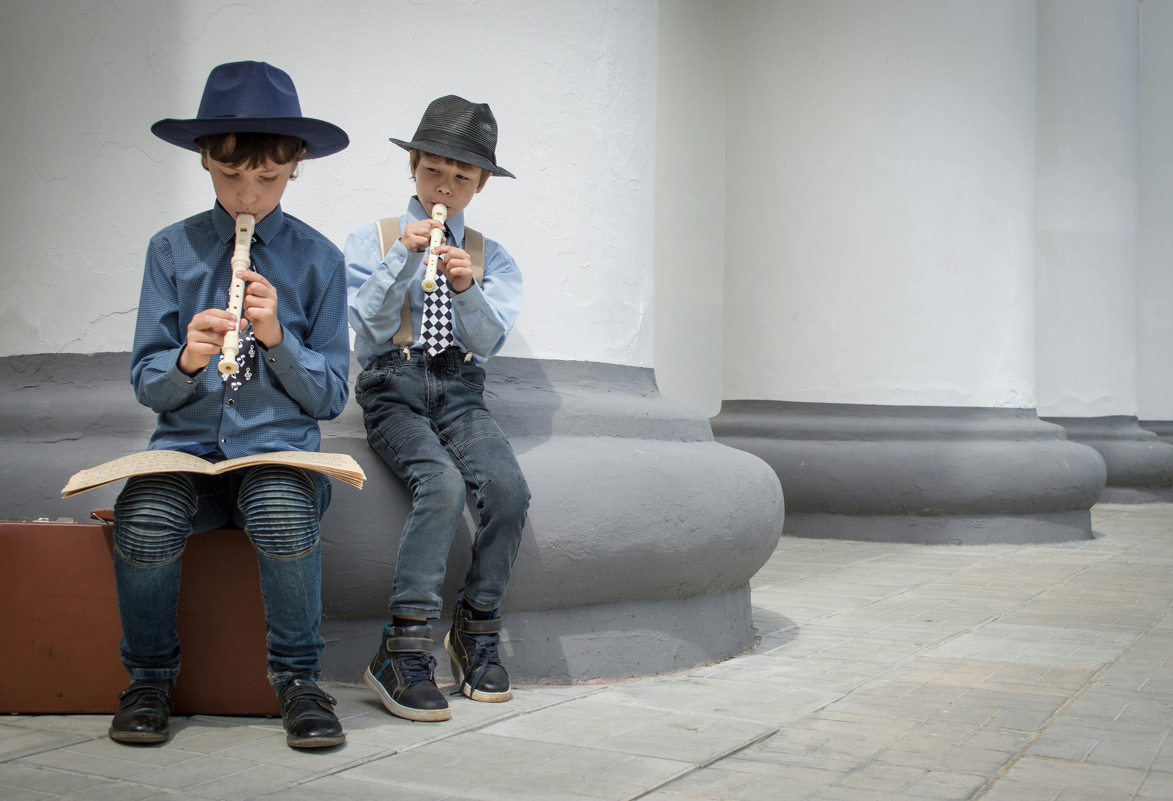 A Woman Crying while Playing Flute · Free Stock Photo