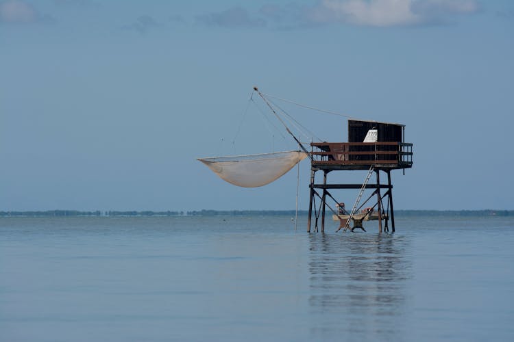 A Fishing Hut On A Lake