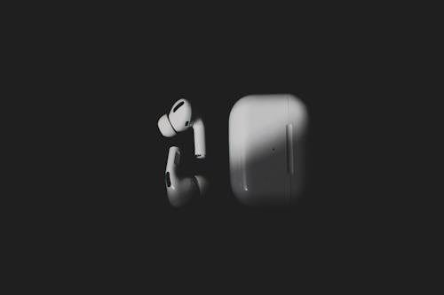 Free White Apple Airpods on Black Background Stock Photo