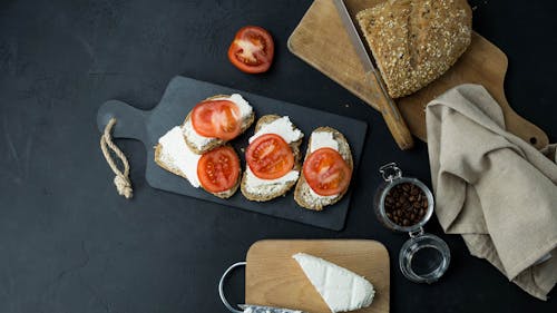 Sliced Bread with Soft Cheese and Sliced Tomatoes 