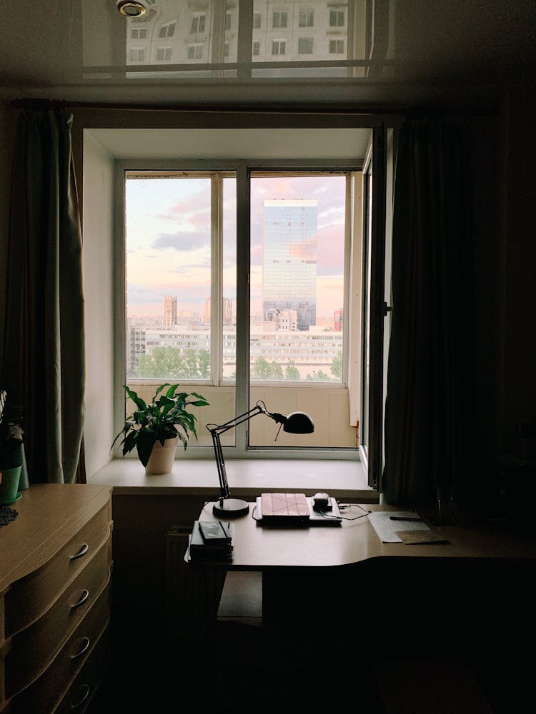 Home Office Area By The Window With The View On The City 