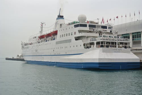 Free A Ferry Docked at a Passenger Terminal Stock Photo