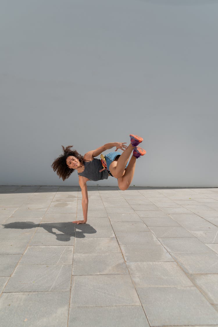 A Woman Breakdancing