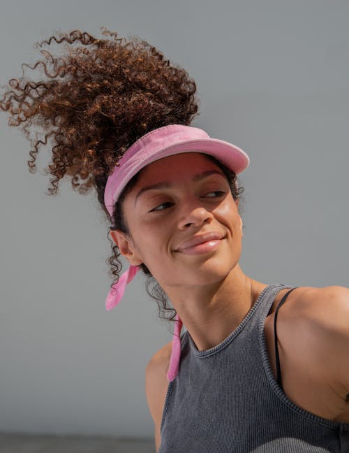 Woman Wearing Pink Visor