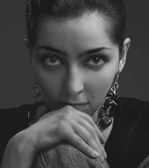 Grayscale Photo of Woman with Earrings 