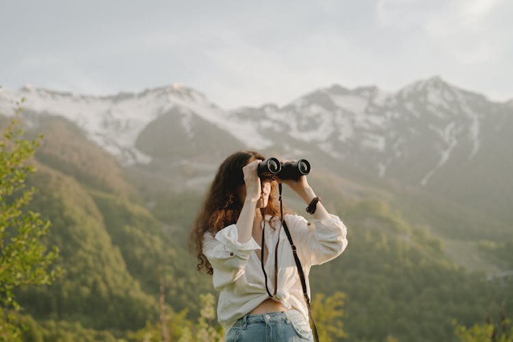 A Woman Using Binoculars