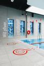 A Swimming Pool Center with a Slogan Written on the Wall