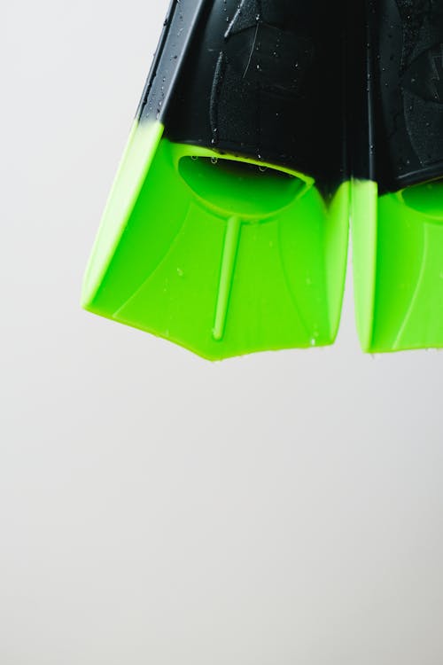 A Pair of Green and Black Wet Flippers 