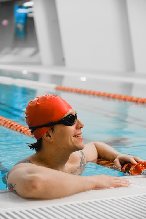 Free A Man Wearing Goggles and a Swimming Cap Stock Photo