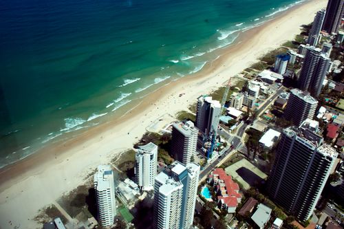 Free A stunning aerial view of Gold Coast's beachfront skyline, showcasing the azure ocean and sandy shores. Stock Photo