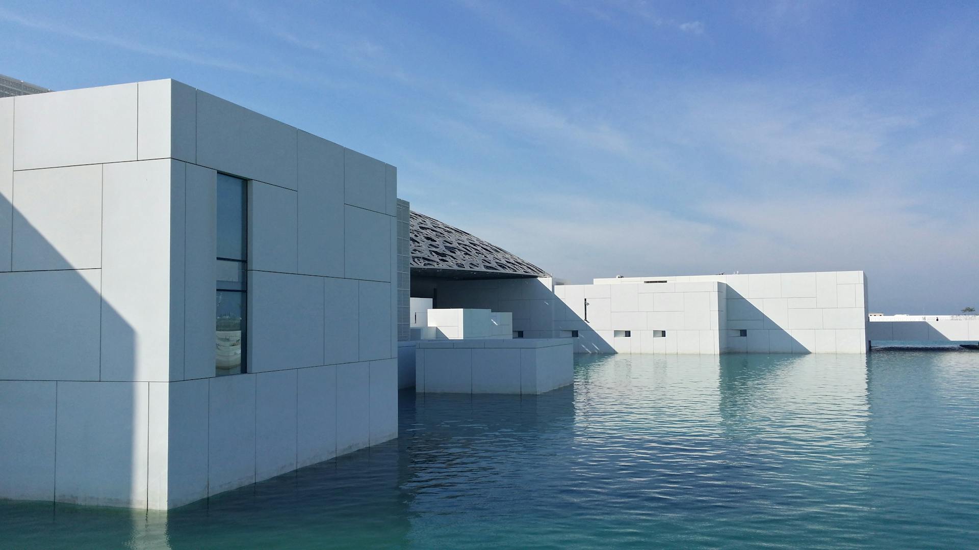 White Building Surrounded With Water