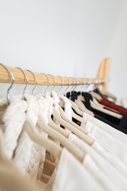 Free White Dress Shirt on Brown Clothes Hanger Stock Photo