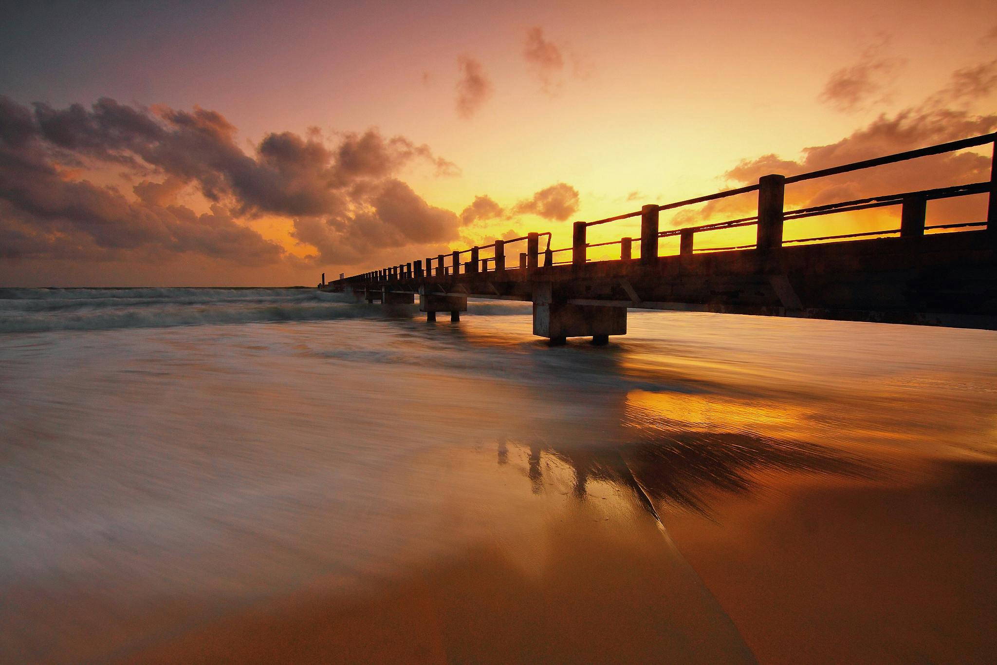 silhouette of pier