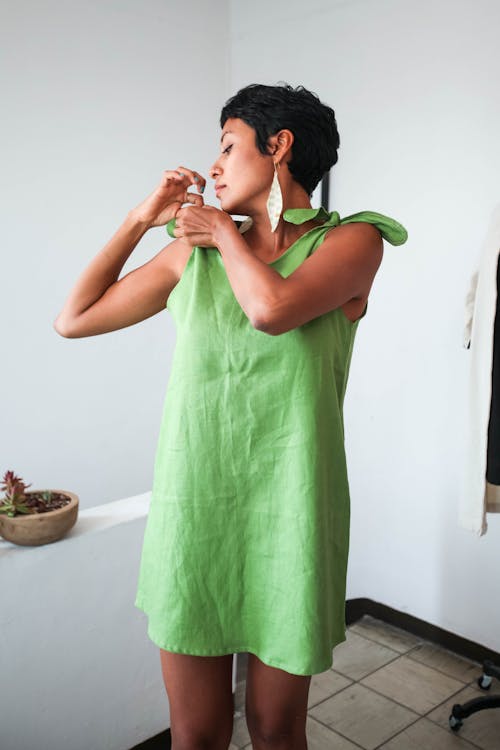 Woman in Green Sleeveless Dress